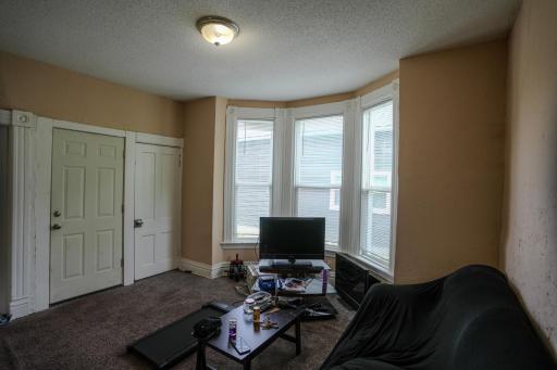 lower unit living room showcases large windows