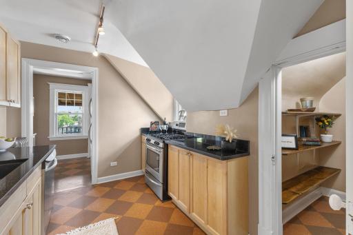 Granite counter tops, windows all over, great light and space to cook.