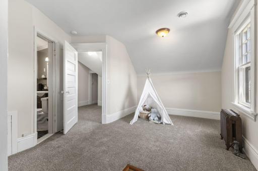 This second bedroom leads to a large sitting room with another closet