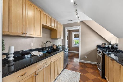 Galley kitchen with a walk in pantry