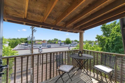 Charming deck over looks the roof tops