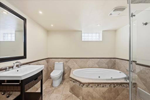 Beautiful full bath on the lower level has heated floors!