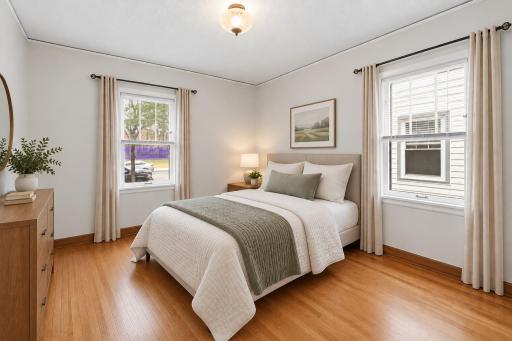 Main floor bedroom is virtually staged.