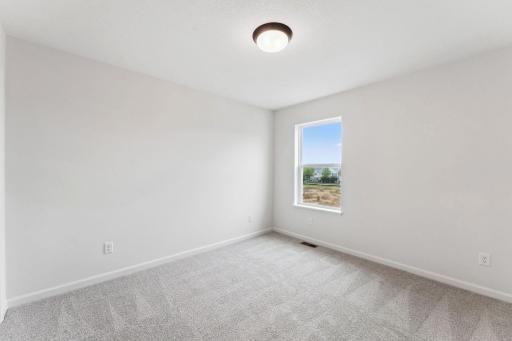 1 of 2 secondary bedrooms. Similar home shown, Color and options can vary.