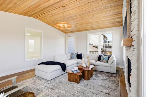 Main Level Sun Room - Viewing window to the sport court