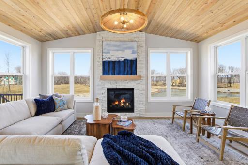 Main Level - Sun Room with gas fireplace with Northern Views