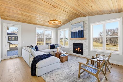 Main Level - Sun Room with gas fireplace