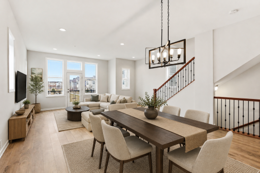 Dining and living area - virtually staged.png
