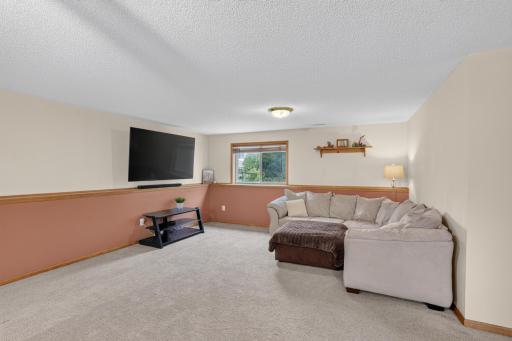 Lower level - Ideal for movie nights, recreation, hobbies, or gatherings.