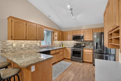 Ample prep space, pantry storage, and functional layout support daily living.