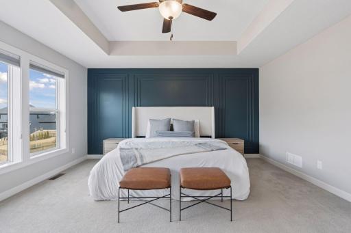 Lovely primary bedroom with tray ceciling