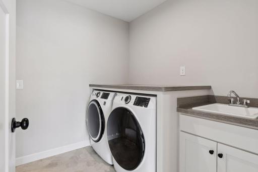 Upper level laundry adjacent to the closet