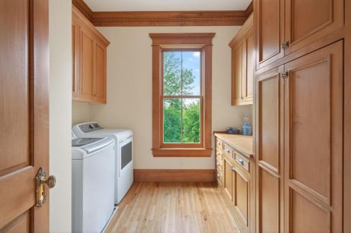 Main level washer and dryer with loads of storage