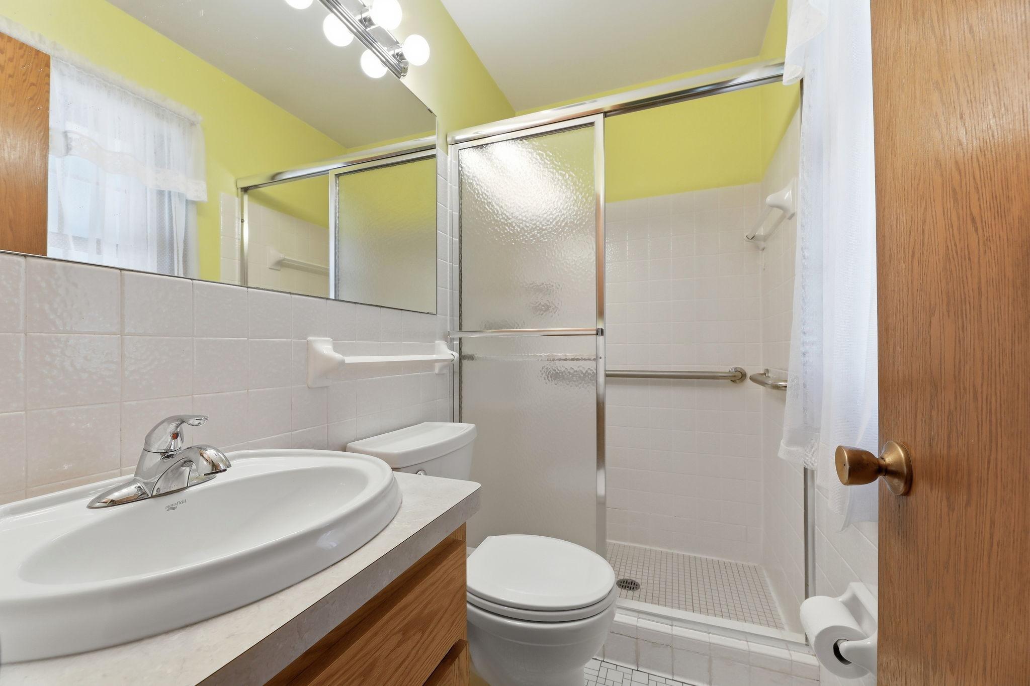 Main floor primary bathroom ensuite.