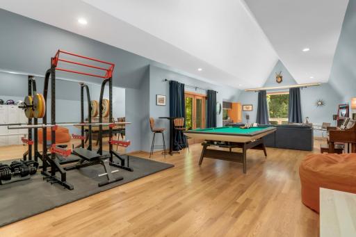 Hardwood floors and a vaulted ceiling over the garage offer endless possibilities.