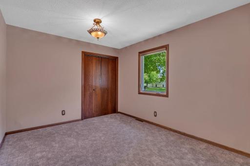 Formerly the 3rd bedroom on the main floor - these sellers opened up the wall to make a larger space for her piano and entertaining their large family. Could easily be framed back in for 3 bedrooms on the main floor.