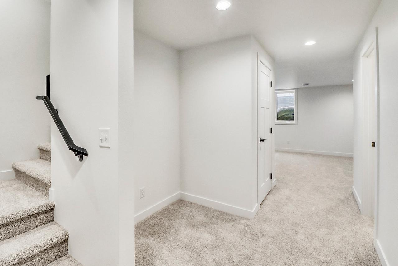Basement w/ storage under stairs