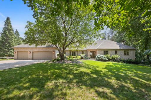 Executive style brick home on the Mississippi river.