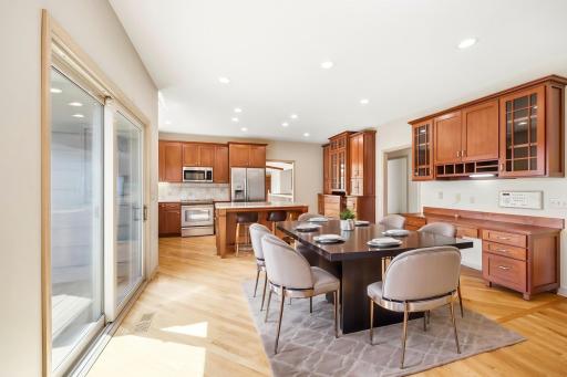 Large open kitchen with flexible dining space.Photo is virtually staged.