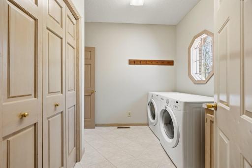 Main floor laundry/mudroom located just off the 3 car garage.