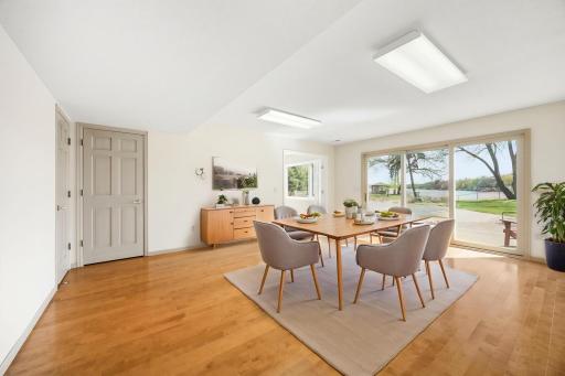Flex space next to full kitchen. Make it a lower level dining space, art studio, toy room, exercise, reading room, etc! Photo is virtually staged.