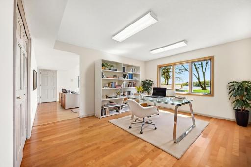 Another flex room in lower. Easily add a wall to make another riverside bedroom or have an office space with pool and nature views. Photo is virtually staged.