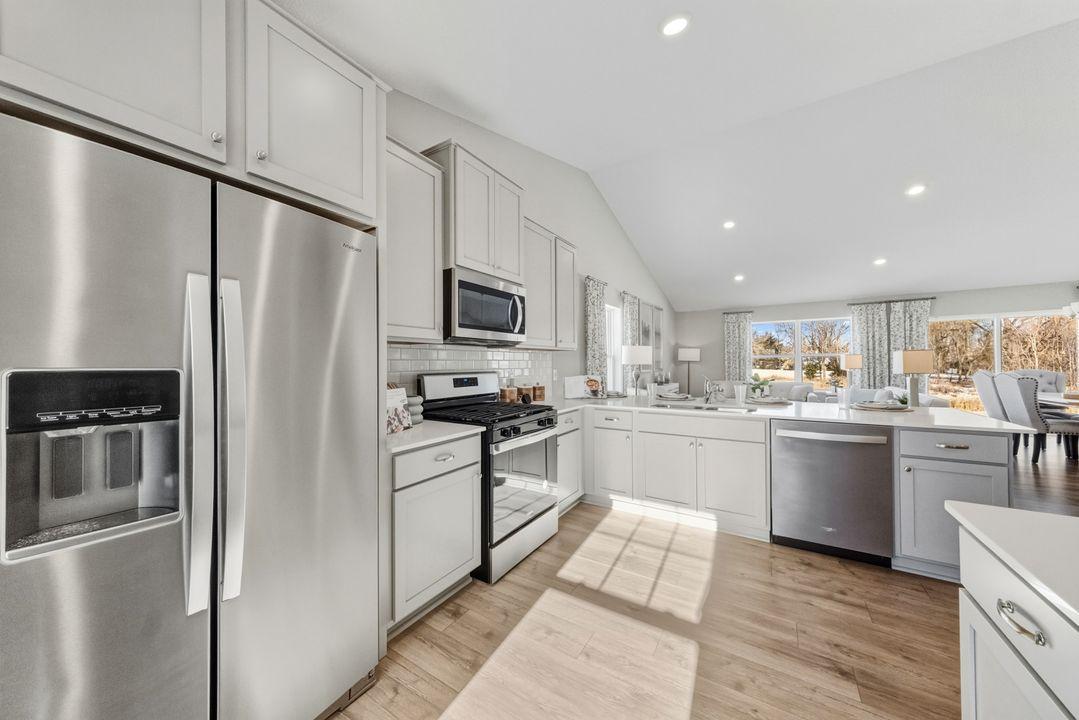 One of the first things you'll notice is our attention to detail throughout the layout, especially here in the kitchen! Photo is of model home. Colors and options may vary. Ask Sales Agent for details.