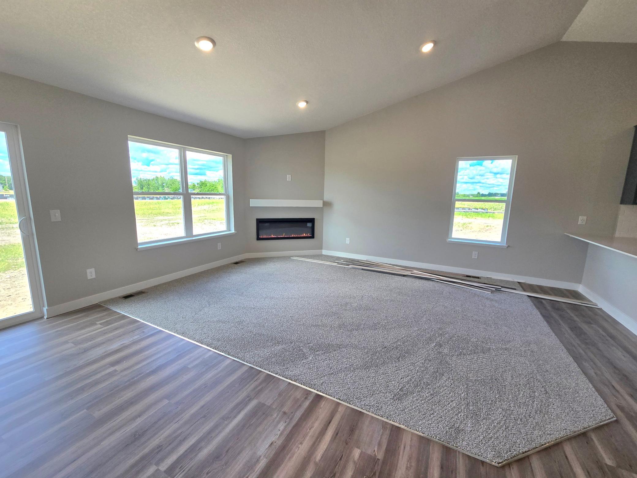 The Bryant II Main Floor at Highlands at Eagle View in Elko New Market. Photo is of actual home. Options and colors may vary. Ask Sales Agent for details.