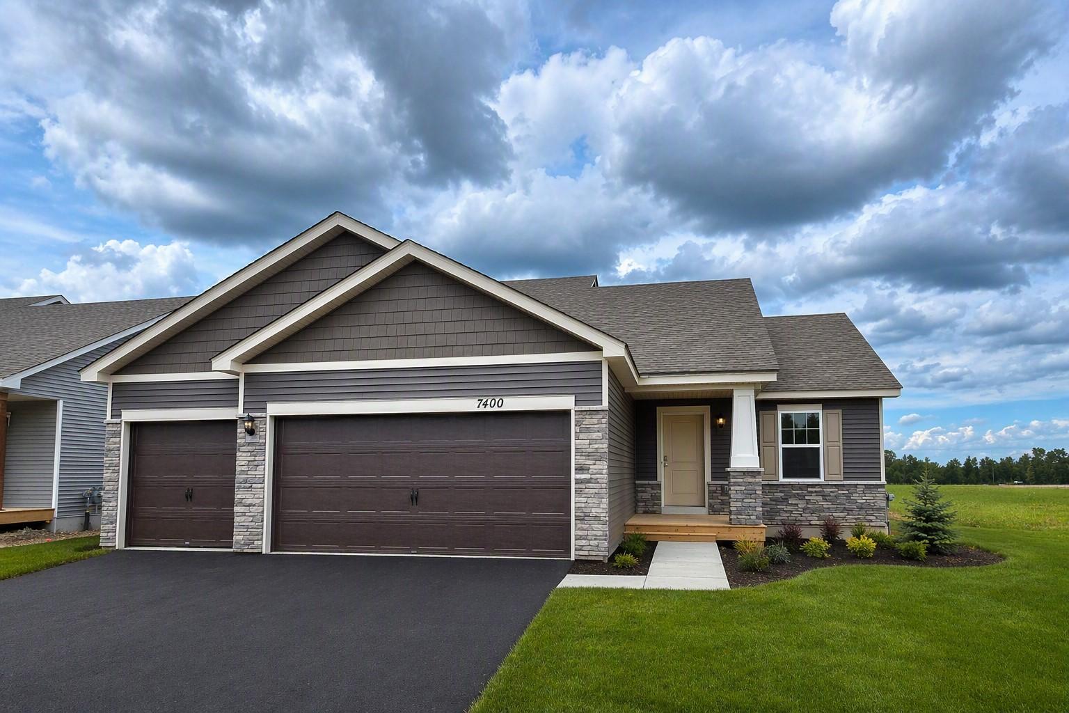 Welcome home to the Bryant II at Highlands at Eagle View in Elko New Market! Photo is of actual home. Options and colors may vary. Ask Sales Agent for details. AI-generated landscaping for visualization. Actual yard condition may differ.