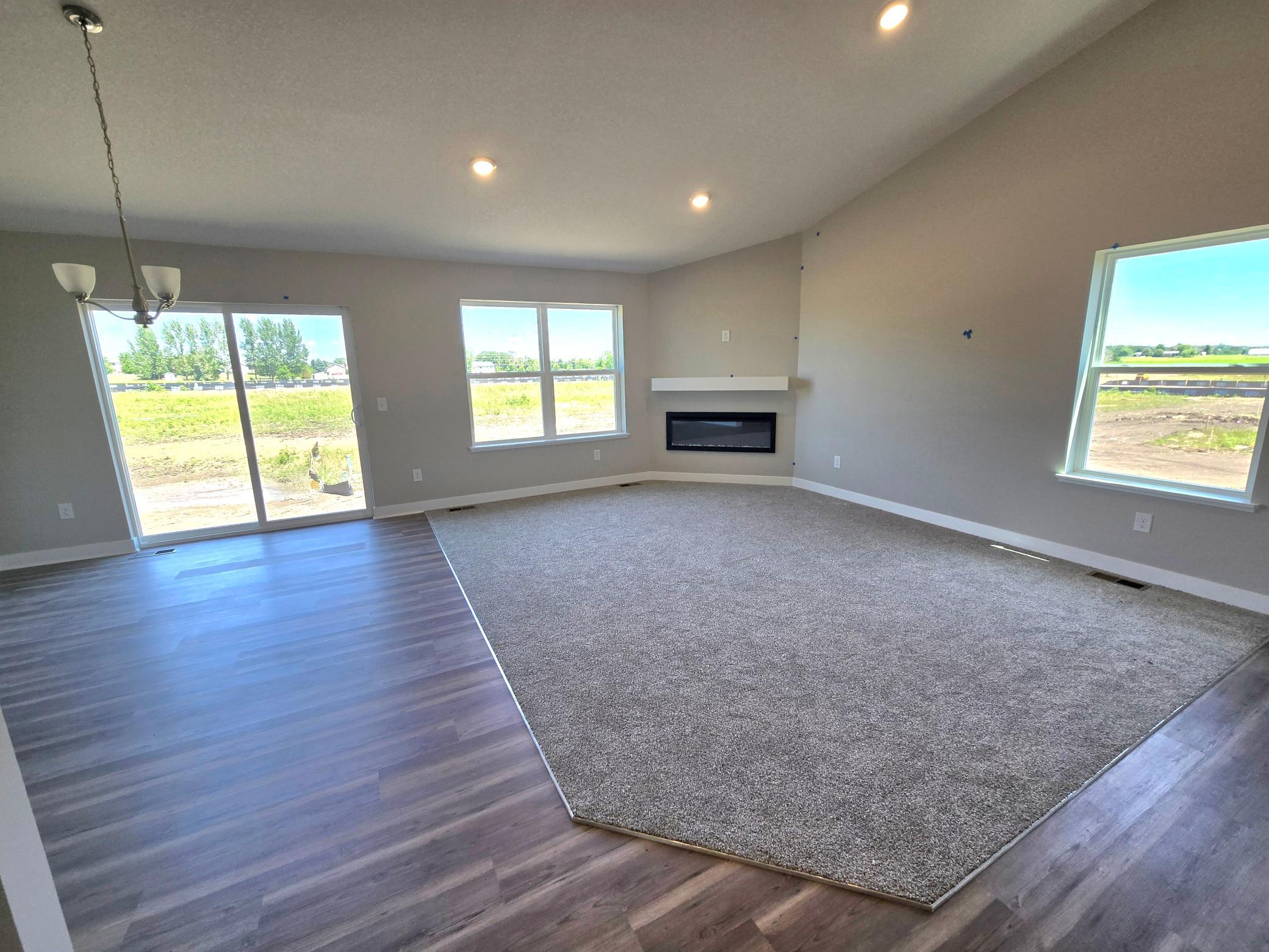 The Bryant II Main Floor at Highlands at Eagle View in Elko New Market. Photo is of actual home. Options and colors may vary. Ask Sales Agent for details.