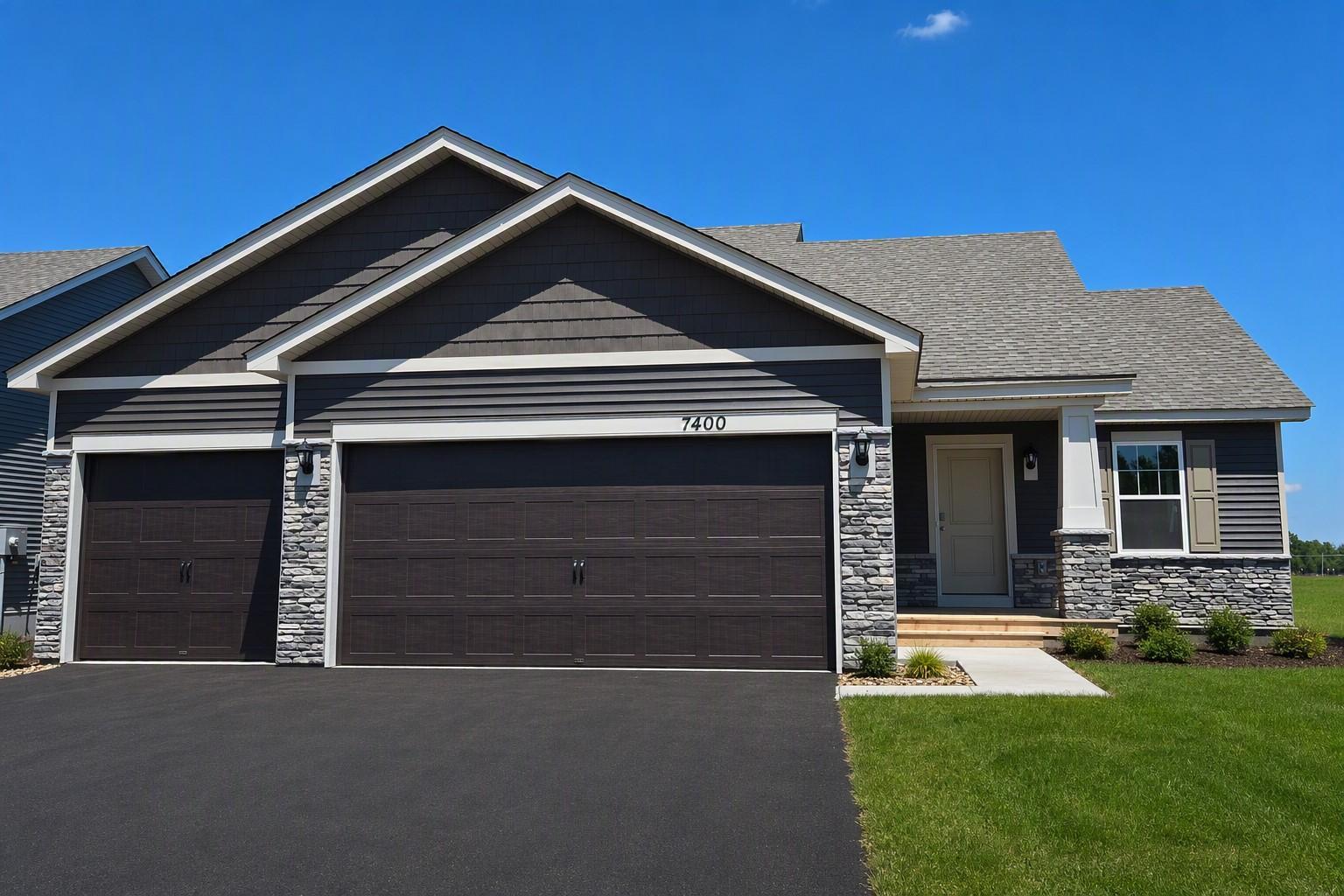 The Bryant II Northern Craftsman at Highlands at Eagle View in Elko New Market. Photo is of actual home. Options and colors may vary. Ask Sales Agent for details. AI-generated landscaping for visualization. Actual yard condition may differ.