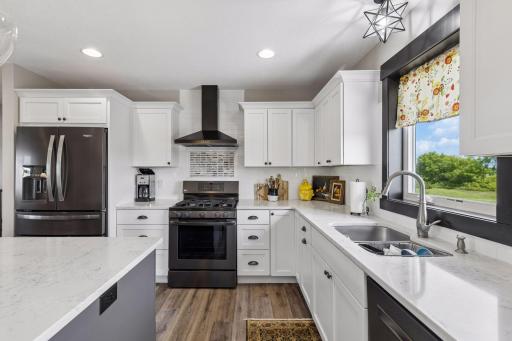 Gourmet kitchen with ample cupboard and counter space