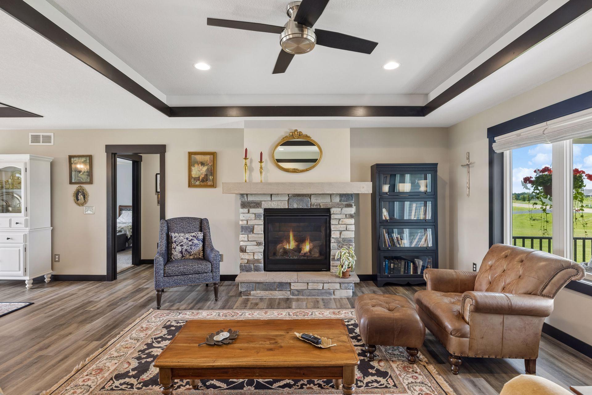 Main living room showcases a gorgeous gas fireplace