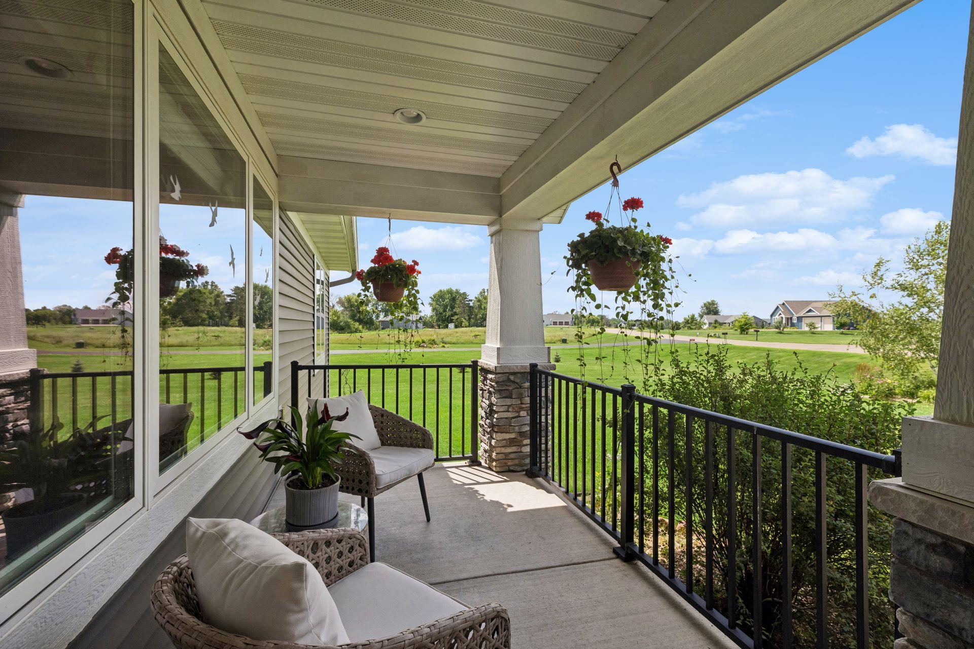Enjoy your morning cup of coffee on the charming front porch