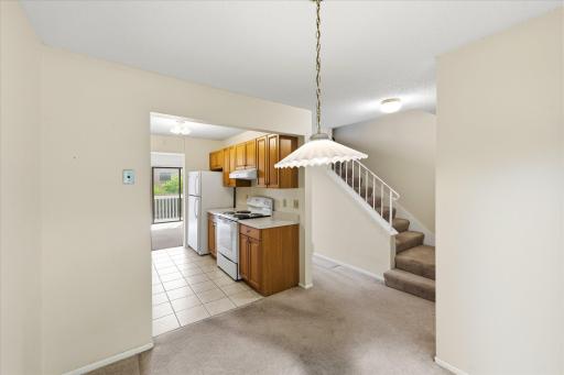 Stairway leads to two bedrooms and the full bath.