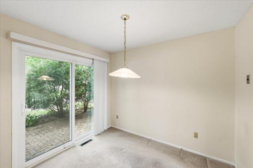 Dining room area with nice sliding door to the front patio.