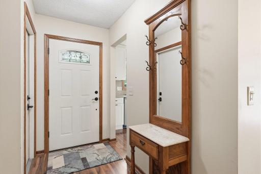 The large foyer entrance area is perfect for greeting guests.