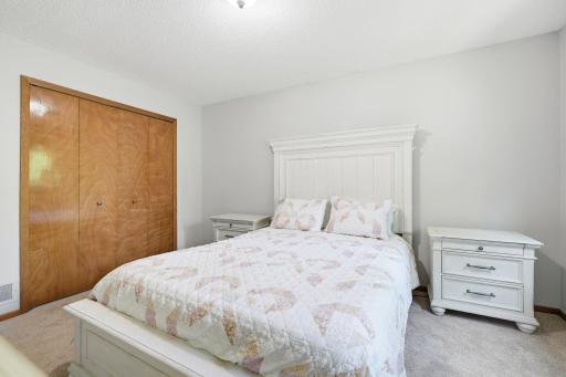 Another view of the primary bedroom which includes a huge closet.