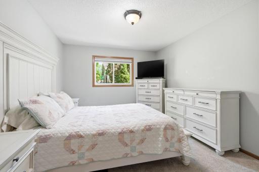 Plenty of room in the large primary bedroom.