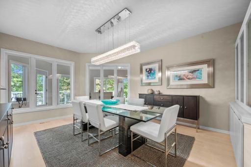 Dining room has view of the lake and pool