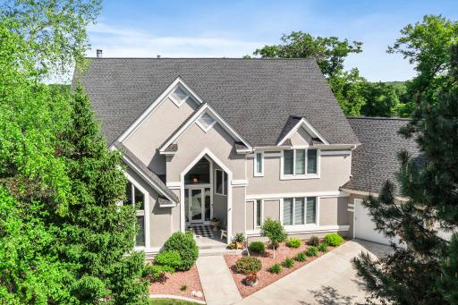 Elegant home sits at the end of cul-de-sac with it's own 275 feet of lakeshore out back