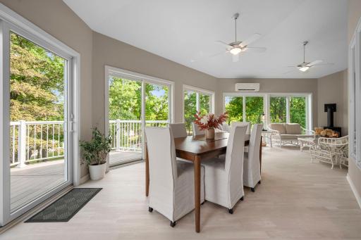 Spacious 4-season porch is climate controlled with it's own fireplace and mini-split