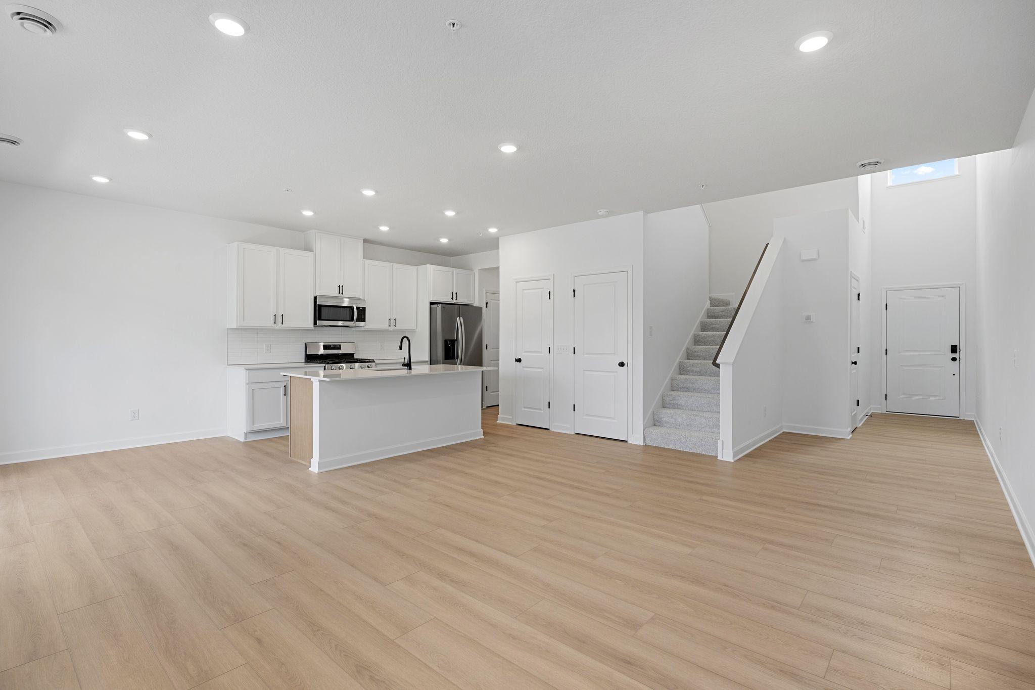 The natural gathering space of the home, the Great Room is excellent for entertaining guests, hosting movie marathons and relaxing with loved ones, paired with the simplicity of a free-flowing design.