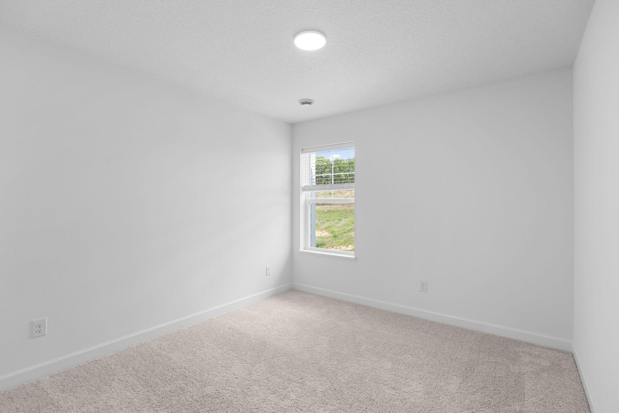 The upper-level secondary bedrooms are perfectly situated away from the downstairs main living areas and are blank canvases ready to be personalized