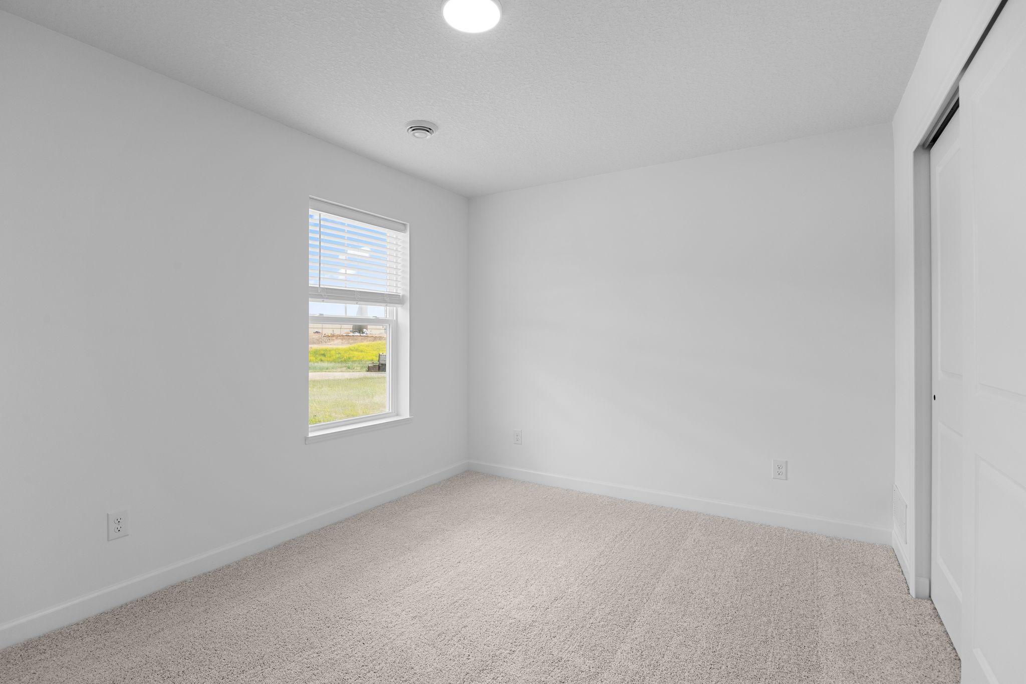 Each secondary bedroom includes premium wall-to-wall carpeting with 6 lb padding for enhanced comfort and a convenient closet