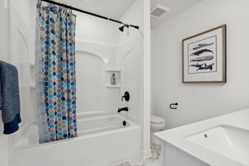 (Photo of a decorated model, actual homes finishes will vary) The secondary bath!