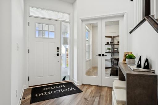 (Photo of a decorated model, actual homes finishes will vary) The foyer.