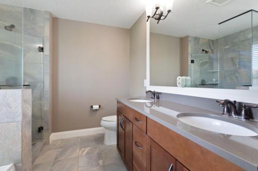 Master Bath with dual vanities and framed mirror