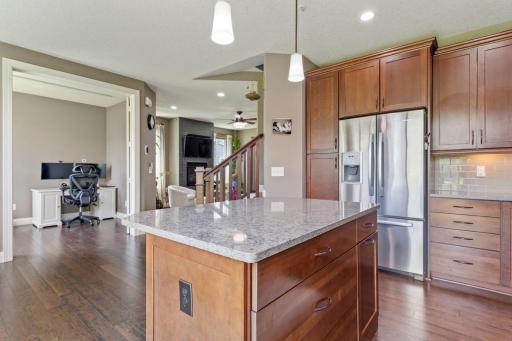 Expresso cherry wood cabinetry, stainless steel appliances