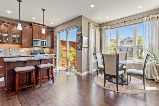 Hardwood floors - patio door leads to back yard space